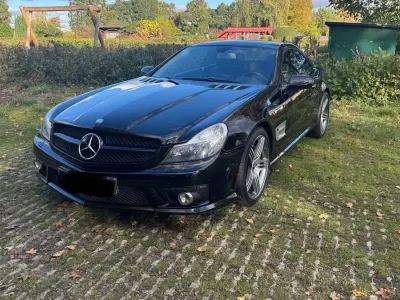 Second-hand Mercedes SL63 AMG AMG 525 CP (386 kW) 2009 Negru Cabrio