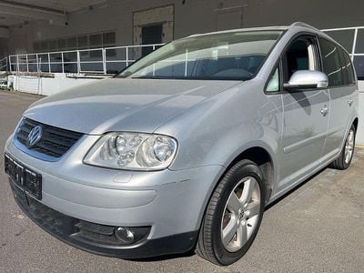 Second-hand VW Touran Highline 140 CP (102 kW) 2006 Argintiu Monovolum