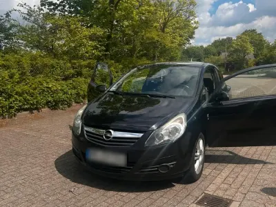 Gebraucht Opel Corsa 69 PS (50 kW) 2010 Schwarz Kleinwagen