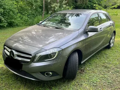 Używany Mercedes A180 Urban 109 KM (80 kW) 2015 Szary Sedan/Limuzyna