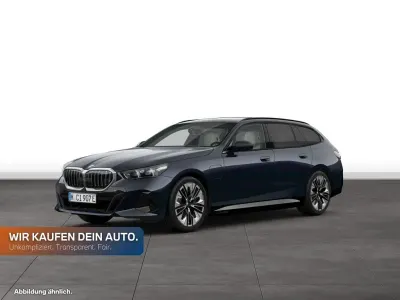 Gebraucht BMW 550e Comfort Edition 489 PS (359 kW) 2026 Carbonschwarz metallic Kombi