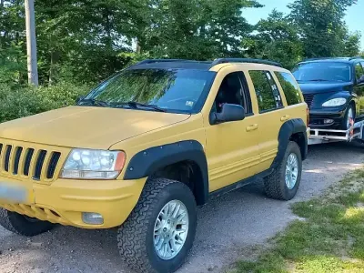 Gebraucht Jeep Grand Cherokee 163 PS (119 kW) 2003 Gelb SUV