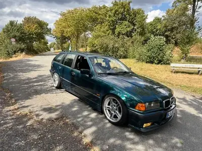 Gebraucht BMW 318 Performance 116 PS (85 kW) 1997 Grün Kombi