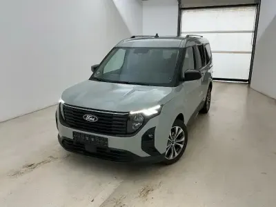 Gebraucht Ford Tourneo Courier Titanium 125 PS (91 kW) 2025 Cactus grau Van / Kleinbus