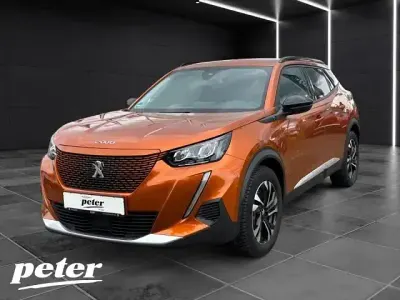 Gebraucht Peugeot e-2008 Allure 100 kW (136 PS) 2022 Met. orange SUV