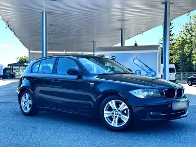 Gebraucht BMW 116 116 PS (85 kW) 2010 Schwarz Kleinwagen