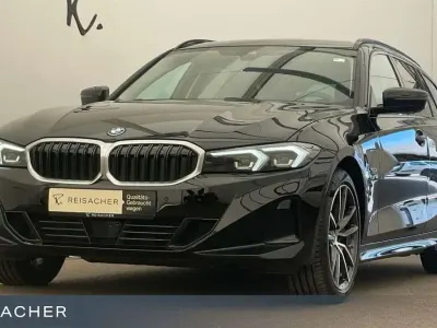 Gebraucht BMW 320e 204 PS (150 kW) 2022 Schwarz uni Kombi