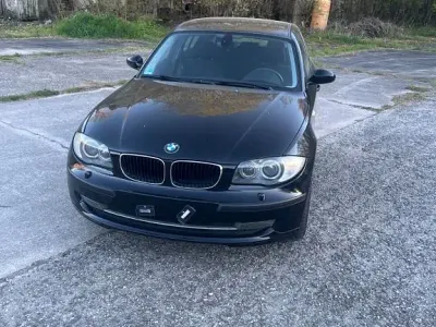 Second-hand BMW 116 Lifestyle 116 CP (85 kW) 2009 Negru Hatchback