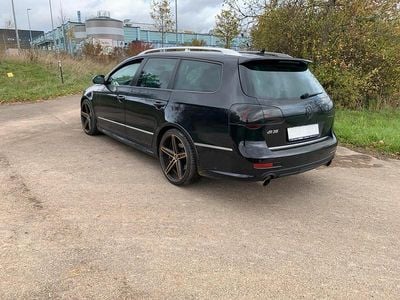 Gebraucht VW Passat R 300 PS (220 kW) 2010 Schwarz Kombi