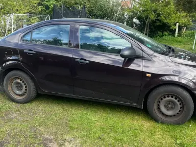 Gebraucht Chevrolet Aveo 101 PS (74 kW) 2013 Braun Limousine