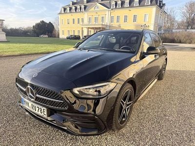 Schwarz Gebraucht 2024 Mercedes C300e AMG line Kombi | 45.900 € (Fairer Preis)