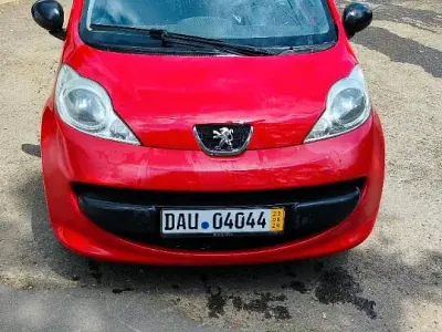 Gebraucht Peugeot 107 68 PS (50 kW) 2007 Rot Kleinwagen