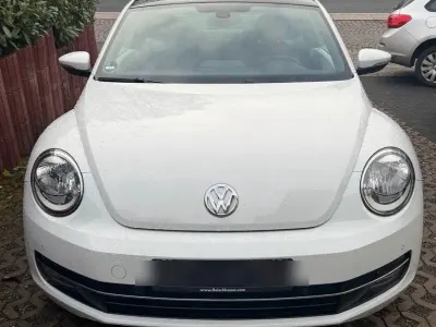 Używany VW Beetle Cup 160 KM (117 kW) 2014 Biały Hatchback