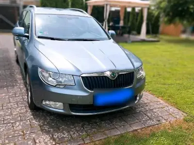Używany Skoda Superb 200 KM (147 kW) 2012 Szary Kombi
