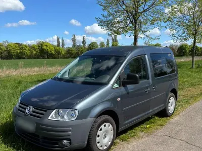 Używany VW Caddy Life 102 KM (75 kW) 2009 Szary Minivan
