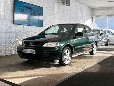 Second-hand Opel Astra Edition 75 CP (55 kW) 2000 Verde Coupe