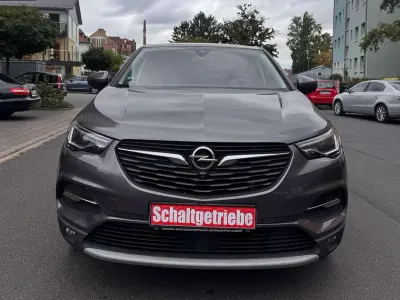 Gebraucht Opel Grandland X Dynamic 120 PS (88 kW) 2018 Mondstein grau/e:vulkan grau SUV