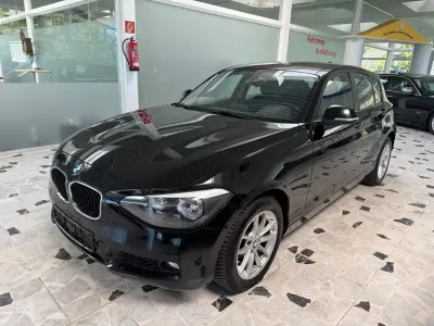 Begagnad BMW 114 Advantage 102 HK (75 kW) 2014 Svart Halvkombi