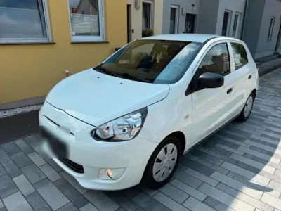 Gebraucht Mitsubishi Space Star 71 PS (52 kW) 2015 Weiß Kleinwagen
