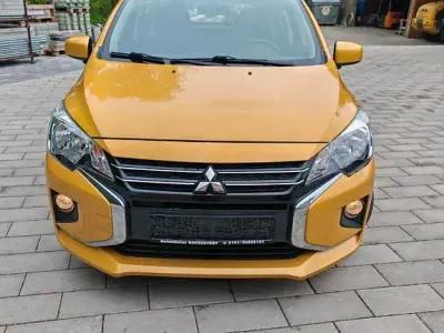 Gebraucht Mitsubishi Space Star Basis 71 PS (52 kW) 2021 Gelb Kleinwagen