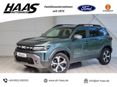 Neu Dacia Duster Journey 140 PS (102 kW) 2025 Oxidgrün Limousine