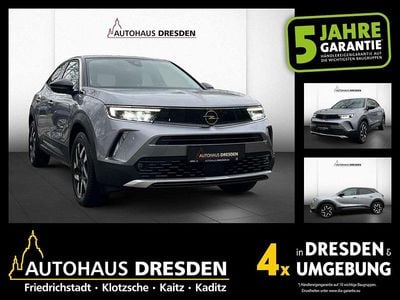 Kontrast grau/quarz silber (metallic) Gebraucht 2022 Opel Mokka-e Elegance SUV | 16.490 € (Superpreis)