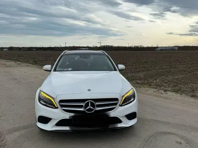 Używany Mercedes C300e 306 KM (225 kW) 2020 Biały Kombi