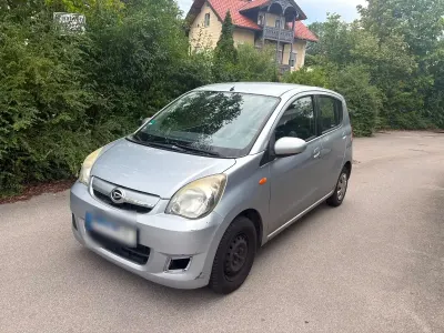 Gebraucht Daihatsu Cuore 69 PS (50 kW) 2011 Silber Kleinwagen