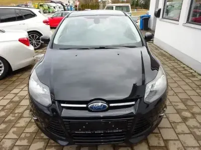 Gebraucht Ford Focus Titanium 116 PS (85 kW) 2011 Pantherschwarz metallic Limousine
