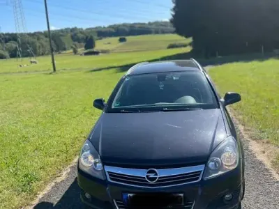 Gebraucht Opel Astra 120 PS (88 kW) 2010 Schwarz Kombi