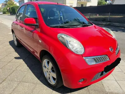 Gebraucht Nissan Micra 65 PS (47 kW) 2010 Rot Kleinwagen