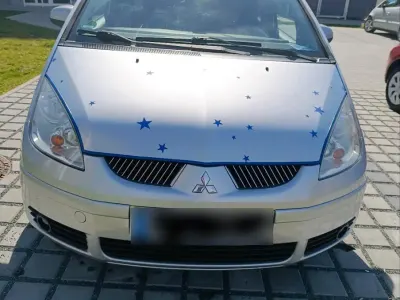 Occasion Mitsubishi Colt Motion 100 ch (73 kW) 2008 Argent Citadine