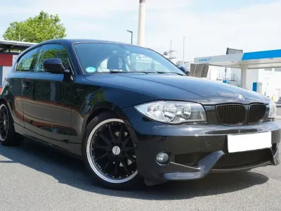 Gebraucht BMW 116 Performance 122 PS (89 kW) 2010 Schwarz Kleinwagen