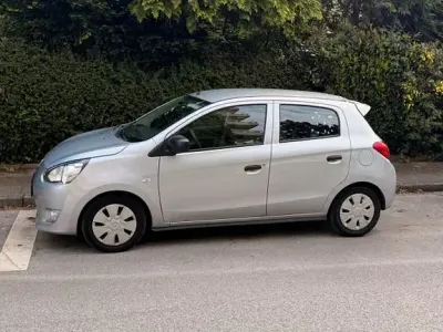 Gebraucht Mitsubishi Space Star 71 PS (52 kW) 2014 Silber Van / Kleinbus