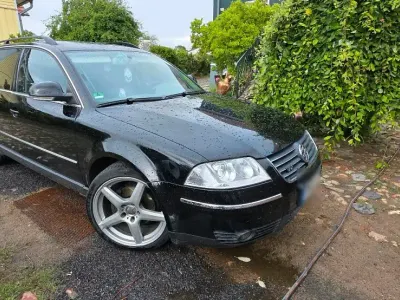 Gebraucht VW Passat 131 PS (96 kW) 2004 Schwarz Kombi