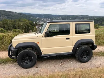 Gebraucht Suzuki Jimny 105 PS (77 kW) 2023 Beige SUV