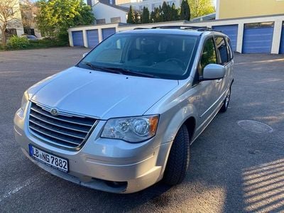 Second-hand Chrysler Grand Voyager Touring 163 CP (119 kW) 2009 Argintiu Monovolum