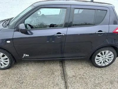Gebraucht Suzuki Swift X-TRA 94 PS (69 kW) 2015 Schwarz Kleinwagen
