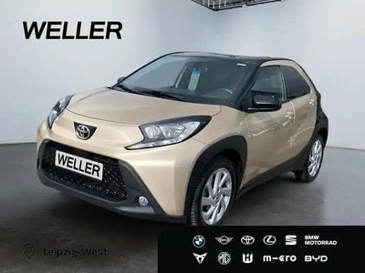 Gebraucht Toyota Aygo 72 PS (52 kW) 2022 Ginger beige metallic / dach nightsky black mica Kleinwagen