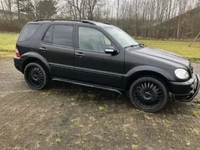Occasion Mercedes ML55 AMG AMG 347 ch (255 kW) 2003 Noir SUV