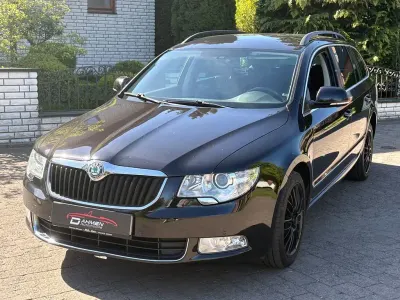 Używany Skoda Superb Elegance 170 KM (125 kW) 2012 Czarny Kombi