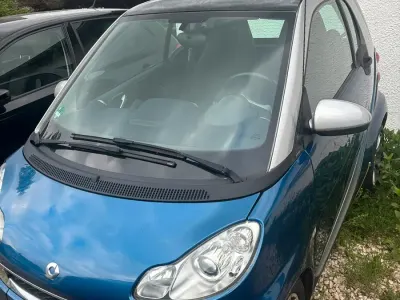 Używany Smart ForTwo Coupé 70 KM (51 kW) 2011 Niebieski Coupe
