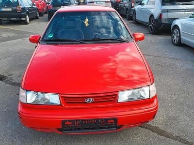 Second-hand Hyundai Accent 95 CP (69 kW) 1994 Roșu Hatchback