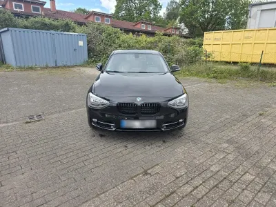 Gebraucht BMW 118 Sport Line 143 PS (105 kW) 2012 Schwarz Kleinwagen
