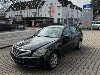 Używany Mercedes C200 136 KM (100 kW) 2010 Czarny Kombi