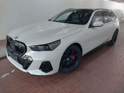 Gebraucht BMW i5 M Sport 250 kW (340 PS) 2024 Mineralweiss metallic Kombi