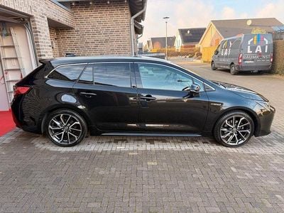 Second-hand Toyota Corolla Lounge 184 CP (135 kW) 2022 Negru Break