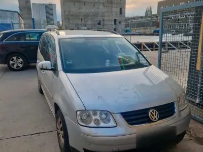 Używany VW Touran 116 KM (85 kW) 2003 Szary Minivan