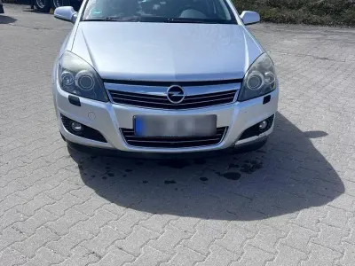 Używany Opel Astra Edition 125 KM (91 kW) 2008 Srebrny Kombi
