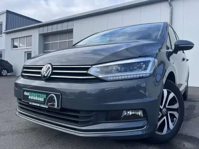 Używany VW Touran Active 122 KM (89 kW) 2021 Szary Minivan